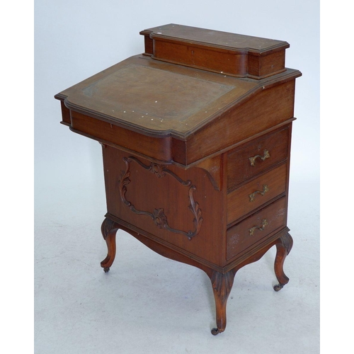 1203 - A Victorian mahogany Davenport with pen box over slope front