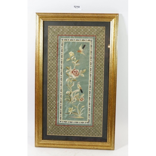 1210 - A Chinese silk embossed panel, 37 x 20cm