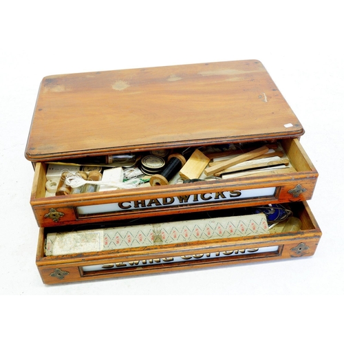 1212 - A Chadwick's Sewing Cotton's advertising two drawer cotton reel box, 53cm wide