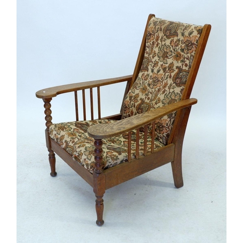 1217 - A vintage oak reclining chair