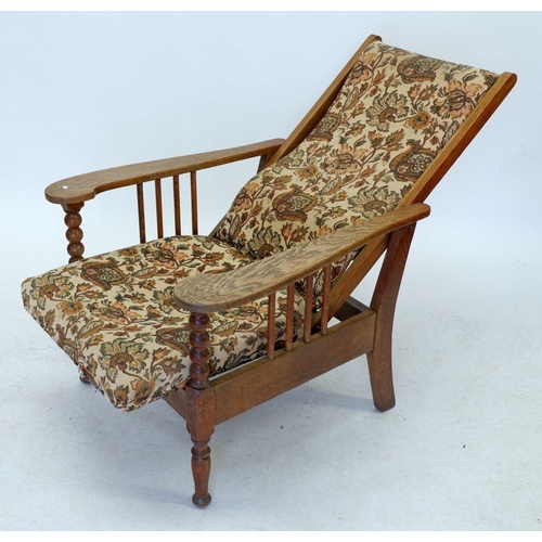 1217 - A vintage oak reclining chair