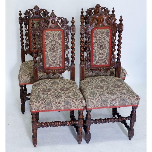 1220 - A set of four Victorian oak Jacobean style dining chairs with carved decoration and spiral supports