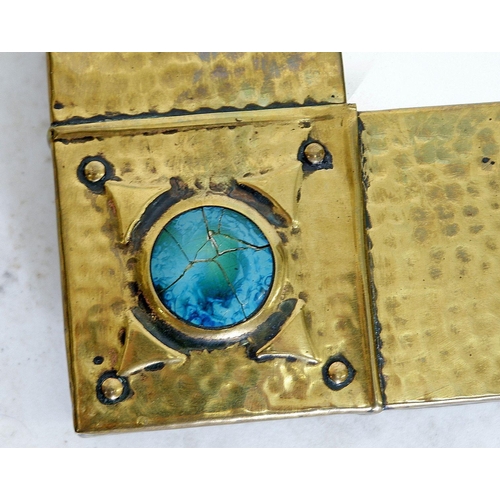 1238 - A Liberty hammered brass framed mirror with turquoise Ruskin roundels and stud detail to corners, ea... 