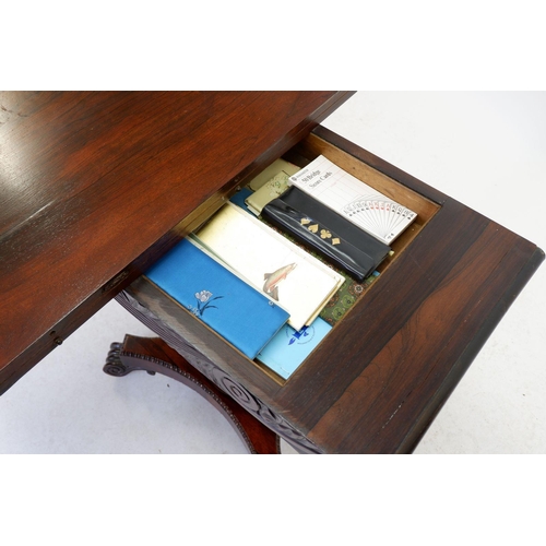 1242 - An early 19th century rosewood fold top card table with tapered colum and platform base