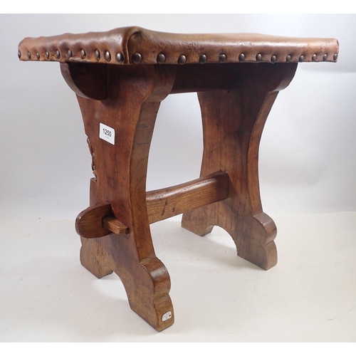 1250 - A 'Gnomeman' Thomas Whittaker small stool with leather seat, 39 x 29 x 27cm