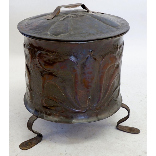 1252 - An Art Nouveau copper coal box with embossed decoration