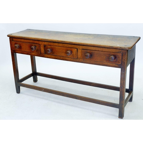 1269 - A Victorian oak dresser base with three drawers on square supports, 148 x 42 x 78cm