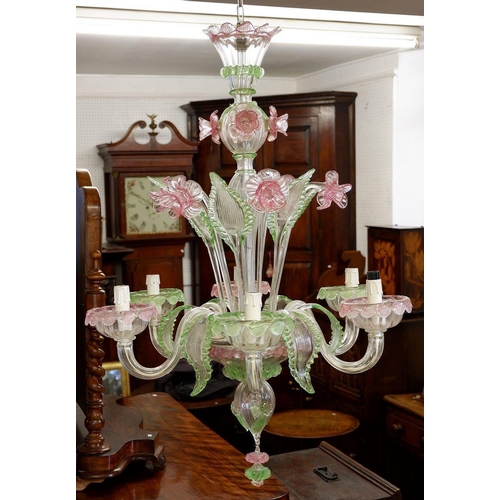 1279 - A large and decorative Murano glass chandelier with pink flowers and green foliage, 90cm drop approx... 