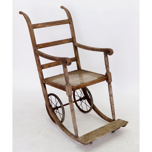 1283 - A Victorian cane seated wheelchair