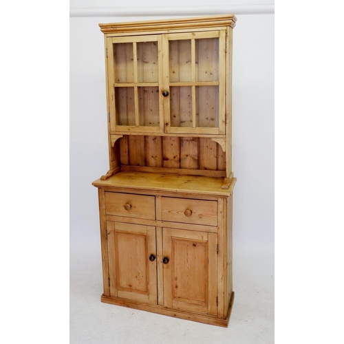 1284 - A Victorian small pine dresser with two glazed doors over drawers and cupboard, 98cm wide