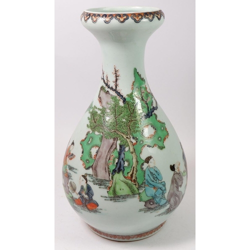 142 - A Chinese famille verte vase decorated figures in a landscape, 30cm