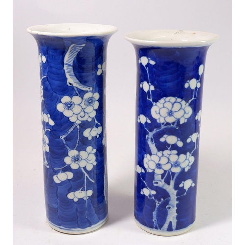 147 - A near pair of late Qing cylindrical prunus blossom vases with four character mark to base, 20cm H