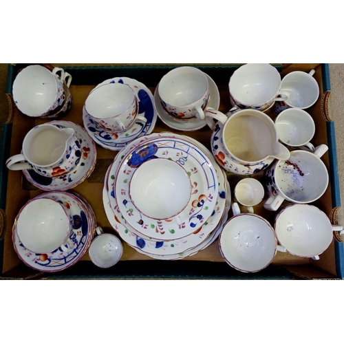 168A - A large collection of Gaudy Welsh china, comprising twelve cups and saucers, two larger cups, two pl... 