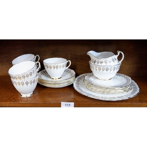 172 - A Royal Vale gilt and white tea service comprising five cups and saucers, six tea plates and cake pl... 