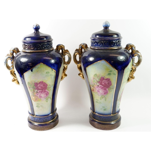 180 - A pair of Victorian large blue and floral vases and covers, 41cm tall