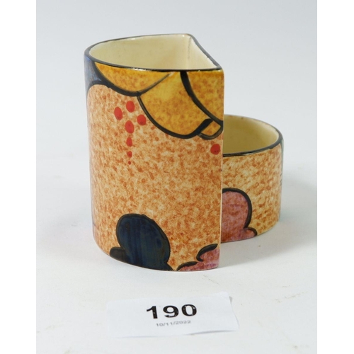 190 - A Clarice Cliff cigarette and match holder marked Cafe au Lait, Bizarre, Newport Pottery