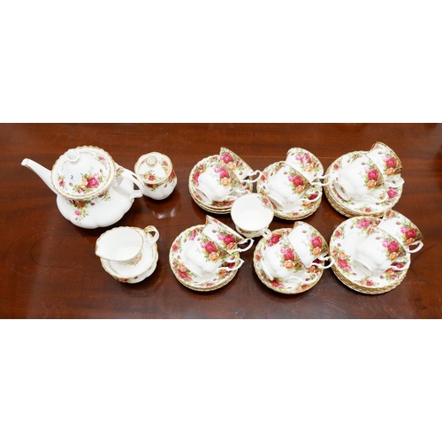 2 - A Royal Albert tea service comprising: thirteen cups, twelve saucers, eleven tea plates, mil jug, su... 