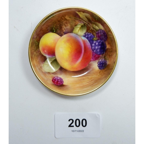 200 - A Royal Worcester small pin dish painted fruit by P M Platt, 7cm diameter, 1955