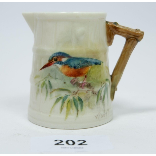 202 - A Royal Worcester minature jug with hand painted kingfisher design, signed N Powell, 6cm