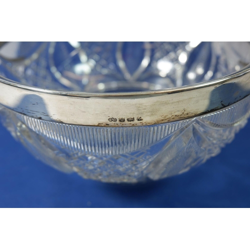 229 - A cut glass bowl with a silver rim, Birmingham 1923