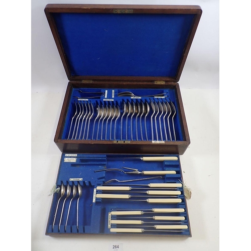 264 - Three oak cased cutlery sets including a Walker & Hall example