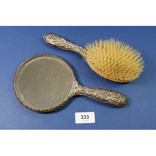 333 - A silver mirror and hair brush