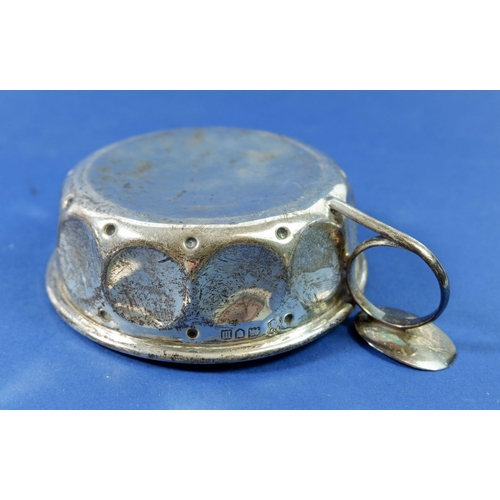 403 - A silver wine taster with circular faceted decoration, 91g, London 1907 by R & W Sorely