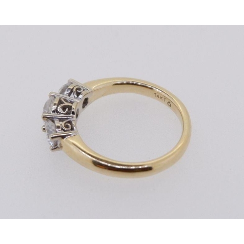 420 - A 14 ct gold ring set three diamonds, size J, 3.6g