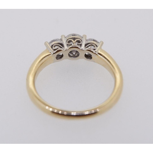 420 - A 14 ct gold ring set three diamonds, size J, 3.6g