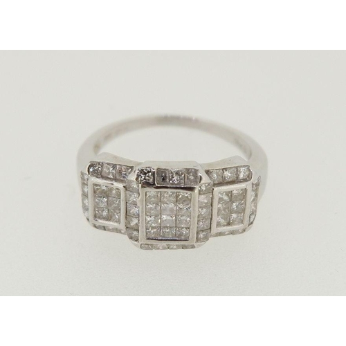 445 - A 14k white gold diamond ring with three panels of diamonds, size L, 4.2g