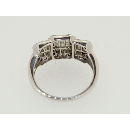 445 - A 14k white gold diamond ring with three panels of diamonds, size L, 4.2g