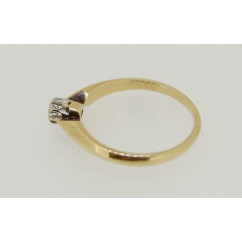 447 - A 14 carat gold solitaire diamond ring, size M to N, 2.4g