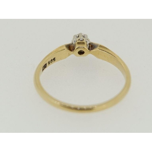 447 - A 14 carat gold solitaire diamond ring, size M to N, 2.4g