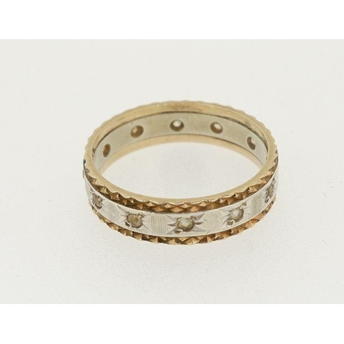 449 - A 9ct gold eternity ring set white stones, size K to L, 2.5g