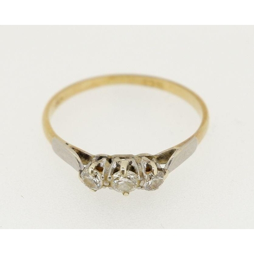 450 - An 18 ct gold three stone diamond ring, size S, 1.8g