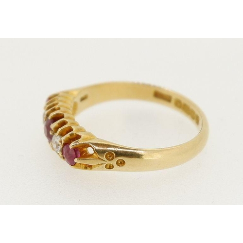 454 - An 18 carat gold ring set three rubies and two diamonds, size O to P