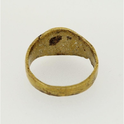 462 - An antique brass ring with 'A' monogram