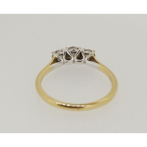 476 - An 18 carat gold three stone diamond ring, 2g, size I - J