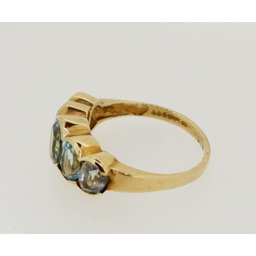 482 - A 9ct gold five stone blue topaz ring, size M to N