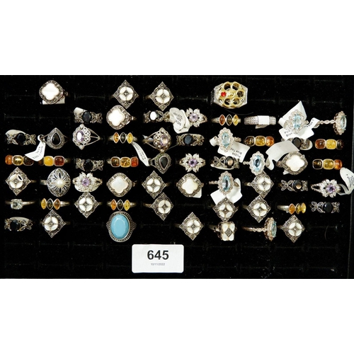 645 - A collection of fifty seven costume rings