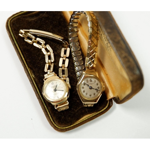 653 - An Avia 9 carat gold ladies wrist watch and gold plated strap and another 'Dot' 9 carat watch on pla... 