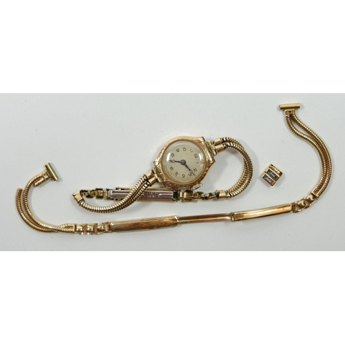 657 - A 9 carat gold ladies wrist watch on gold plated strap plus a 9 carat gold strap