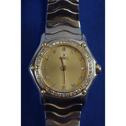 665 - An Ebel Wave stainless steel ladies wrist watch set diamonds to dial