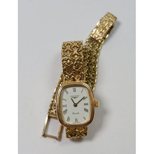 667 - A Longines 9 carat gold ladies quartz wrist watch on knitted 9 carat gold strap, total weight 22g