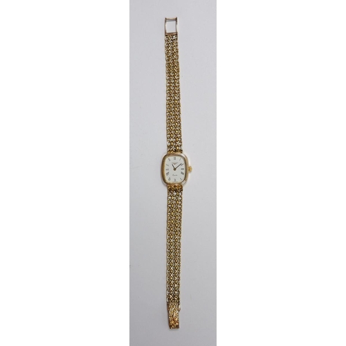 667 - A Longines 9 carat gold ladies quartz wrist watch on knitted 9 carat gold strap, total weight 22g