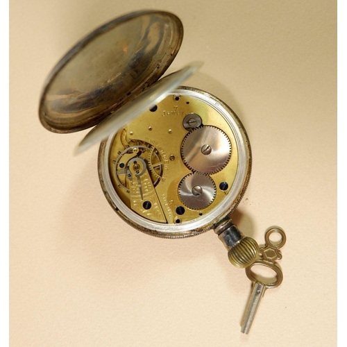 679 - A silver pocket watch and key