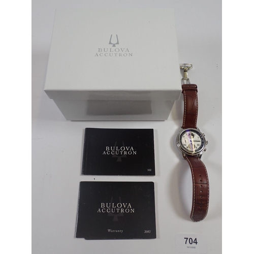 704 - A gentleman’s stainless steel Bulova Accutron wrist watch with automatic movement to a brown leather... 