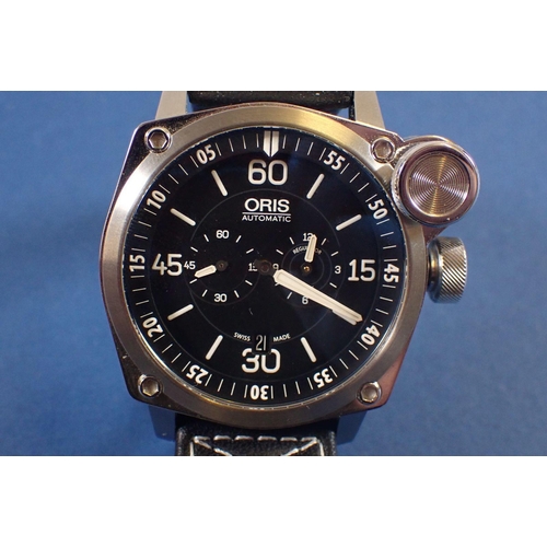 706 - A gentleman’s stainless steel Oris De Meisterflieger wrist watch on a black leather strap with makes... 