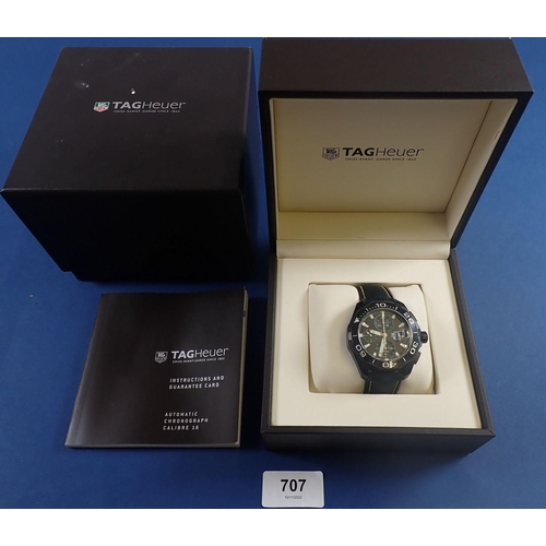 707 - A gentleman’s black ceramic Tag Heuer Aquaracer wrist watch with black fabric strap and yellow stitc... 