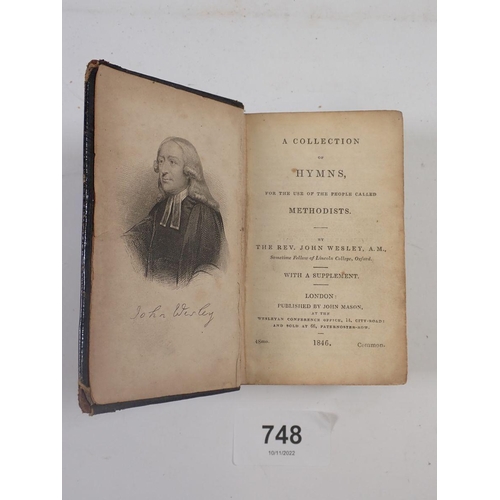 748 - A collection of Hymns by Rev John Wesley 1846, leather bound, 10cm tall
